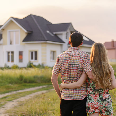 couple looking at a house
