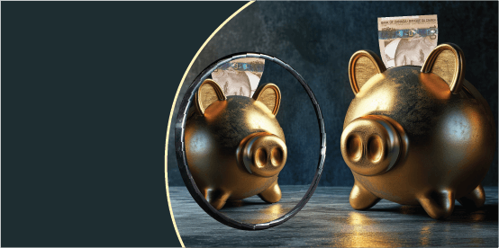 A golden piggy bank with a hundred-dollar bill sticking out it in reflected in a round mirror.